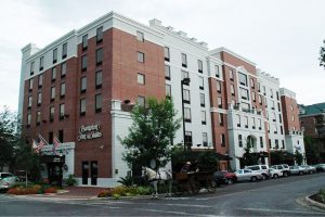 hampton inn key international gainesville acquires hilton suites downtown million